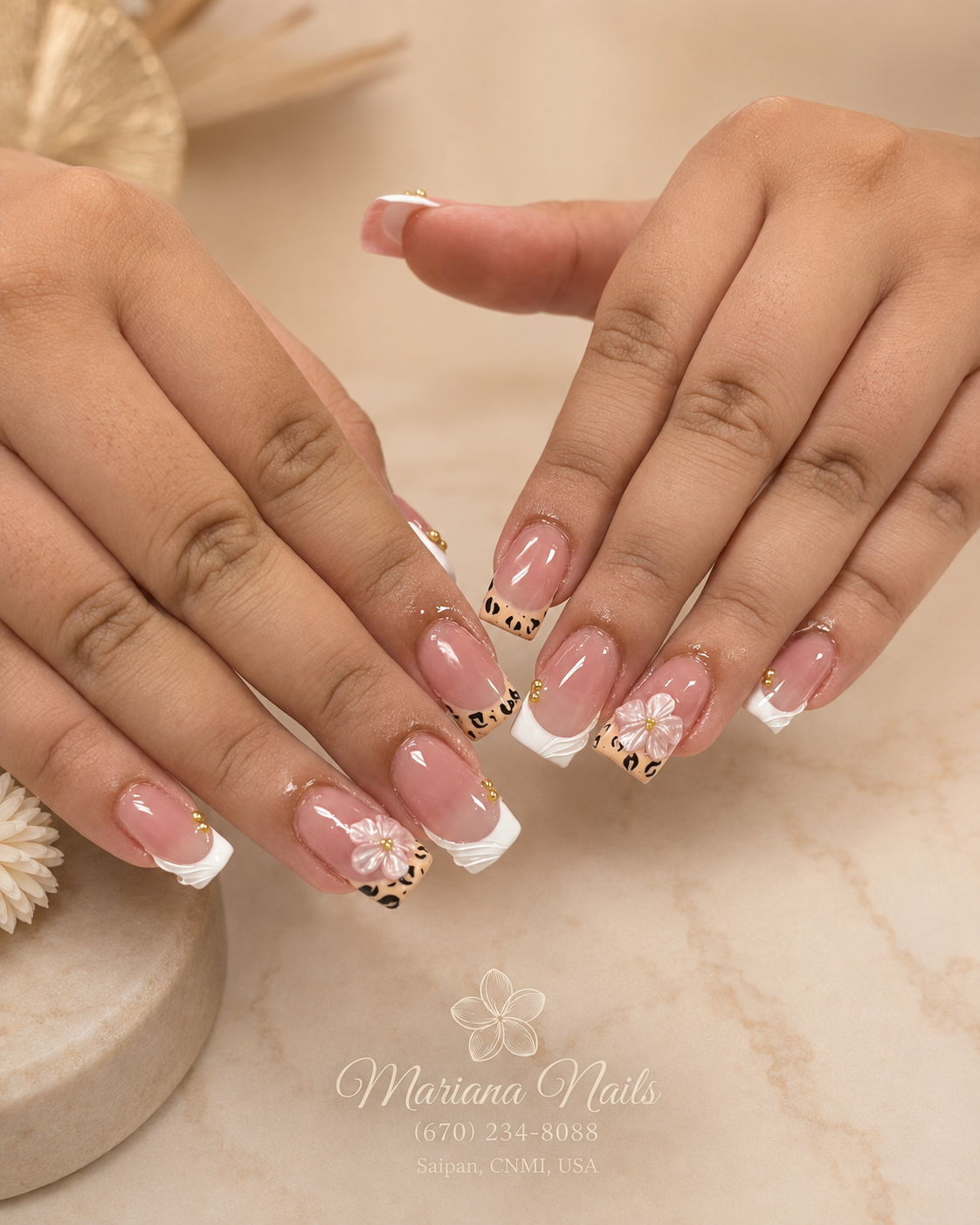 Glossy nude pink square acrylic nails with white French tips, leopard-print accents and 3D pink flowers by Mariana Nails in Saipan