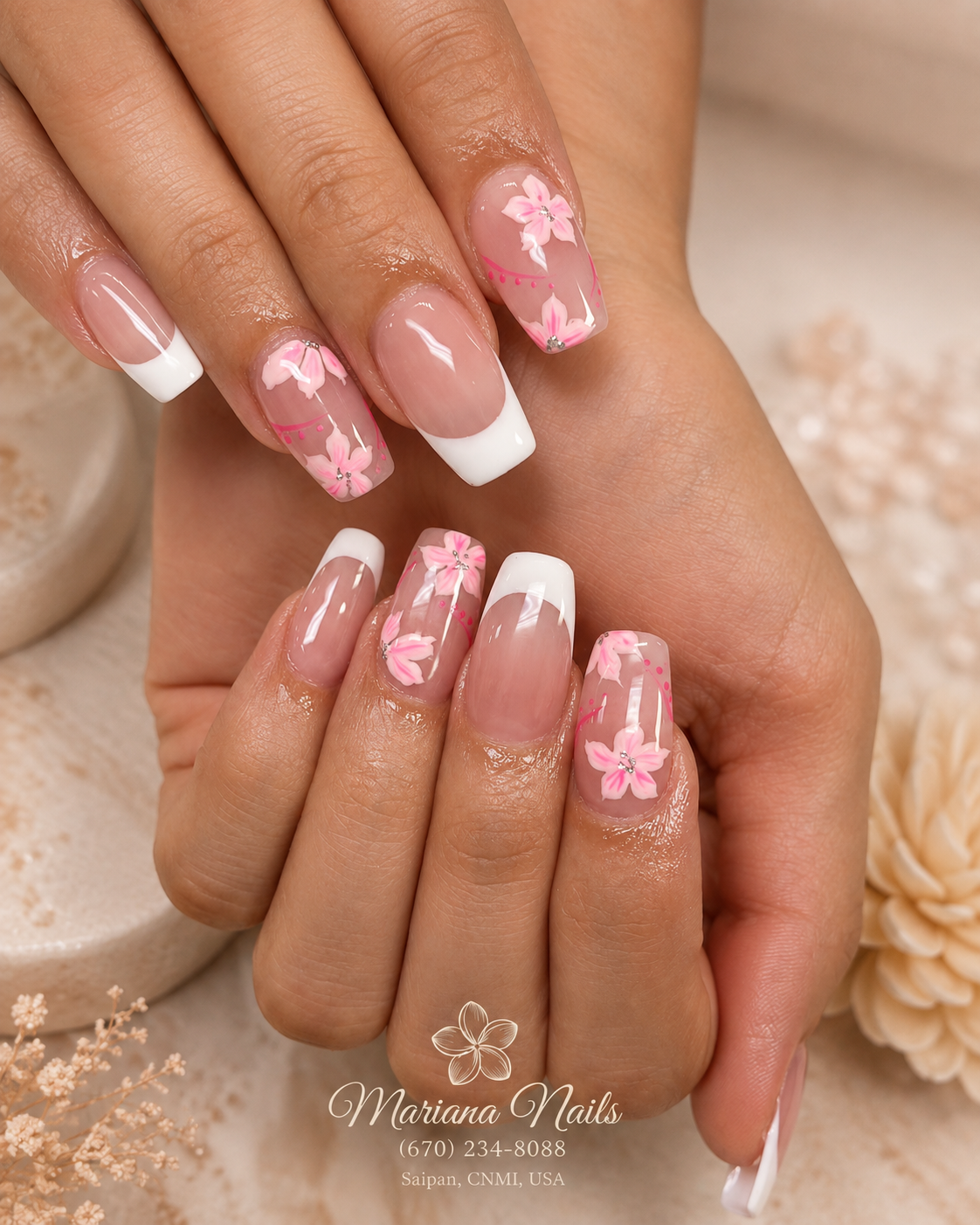 Glossy nude pink square acrylic nails with white French tips and pink cherry blossom floral nail art by Mariana Nails in Saipan